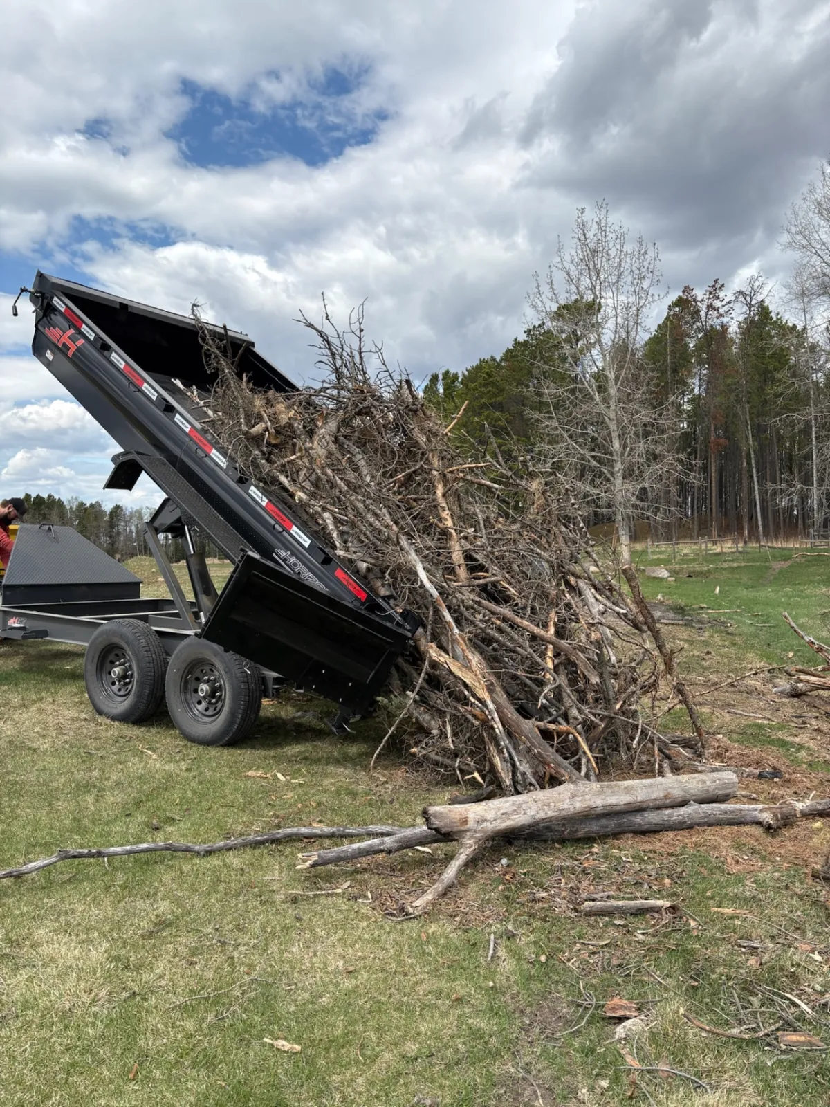 Keystone dump trailer unloading branches